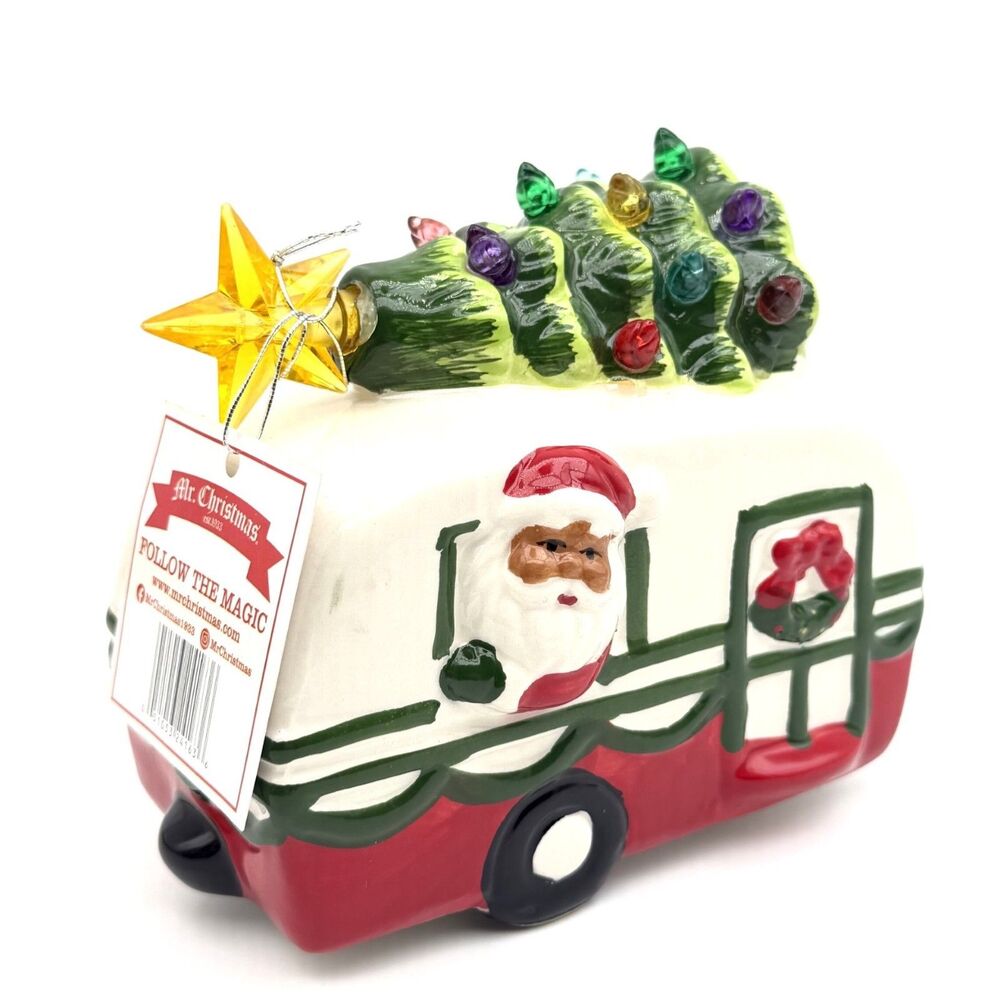 Mr Christmas Santa driving a Camper With Tree LED Lights Up Figurine New
